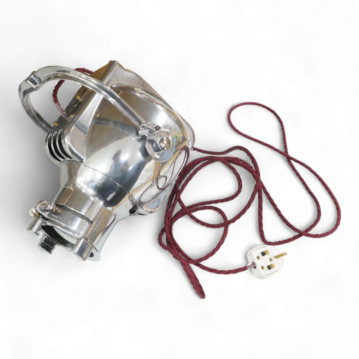 A vintage Strand electric chrome theatre lamp